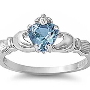 Elegant Silver Claddagh Ring with Blue Heart Stone